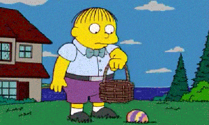 Ralph-Wiggum-Picks-Up-Egg-and-Puts-it-Into-Basket
